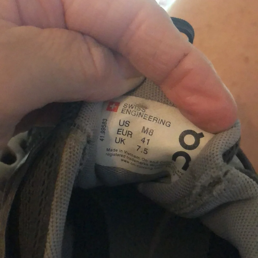 On cloud tennis shoes used condition.  Has some holes,pictures& slits on bottom